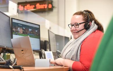 Sanctuary staff member working using a headset