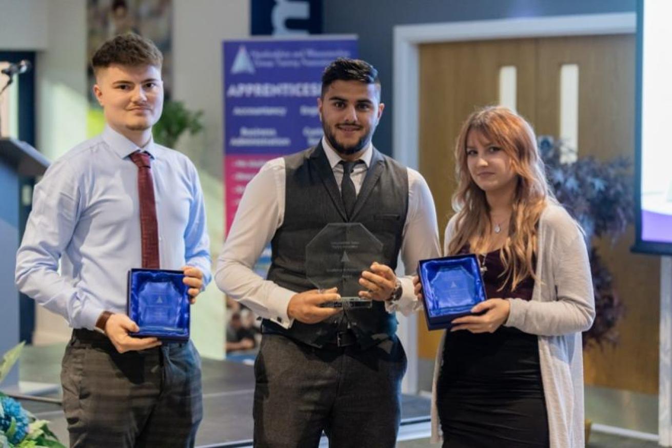 Sanctuary apprentices Matthew Ellis and Keeley Ash with former Sanctuary apprentice Faisal Zaib at the WGTA Apprenticeship Awards ceremony