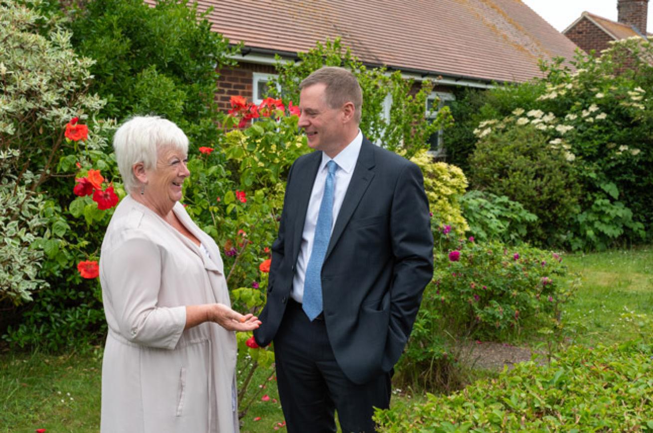 Group Chief Executive Craig Moule talking with a Sanctuary resident