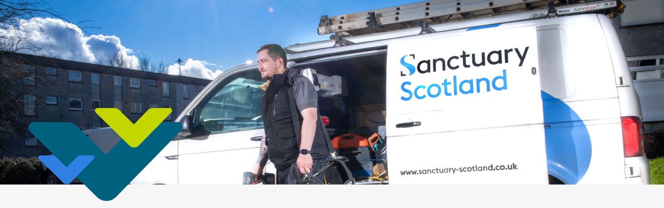 A maintenance person carrying a tool bag and a drill standing in front of a Sanctuary Scotland maintenance vanA maintenance person carrying a tool bag and a drill standing in front of a Sanctuary Scotland maintenance van