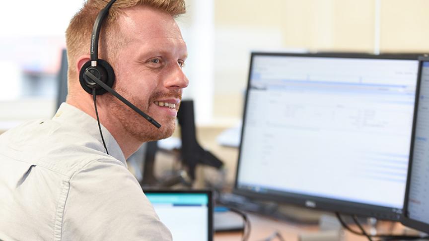 Sanctuary staff member wearing a headset to answer calls