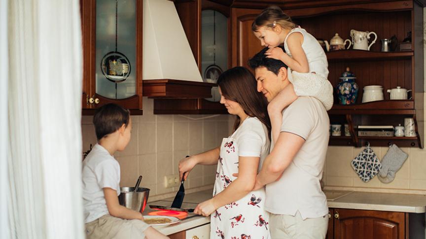 Young family cooking together at Sanctuary