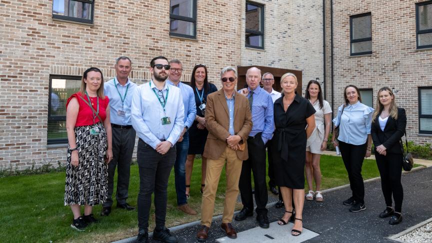 Sanctuary staff and key stakeholders including Glasgow City Council representatives stood outside Anchor Court in Yoker