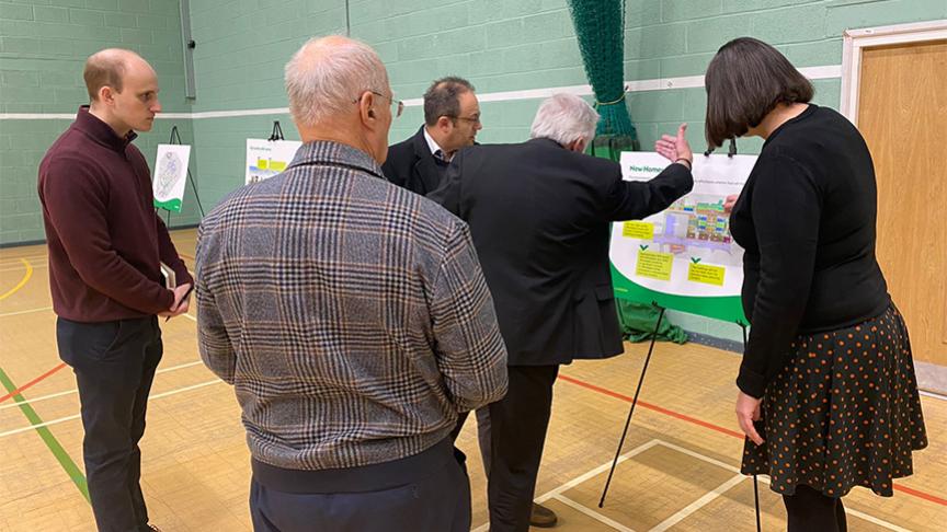 Sanctuary representatives gathered around display boards showing the Laindon regeneration plans