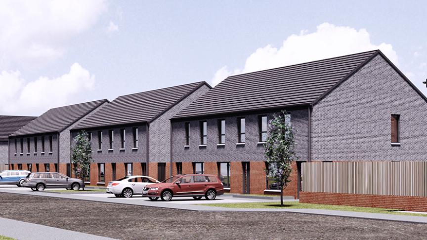 CGI depicting what the affordable homes will look like at Braehead "Row of modern two-story suburban houses with dark gray and red brickwork, pitched roofs, and multiple windows. Cars are parked along the street, and small trees line the grassy area between the sidewalk and road. A wooden fence encloses part of one property under a partly cloudy sky.