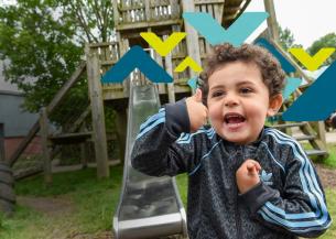 Child in Adidas jacket gives thumbs-up in front of playground slide, with colourful geometric shapes overlaid.